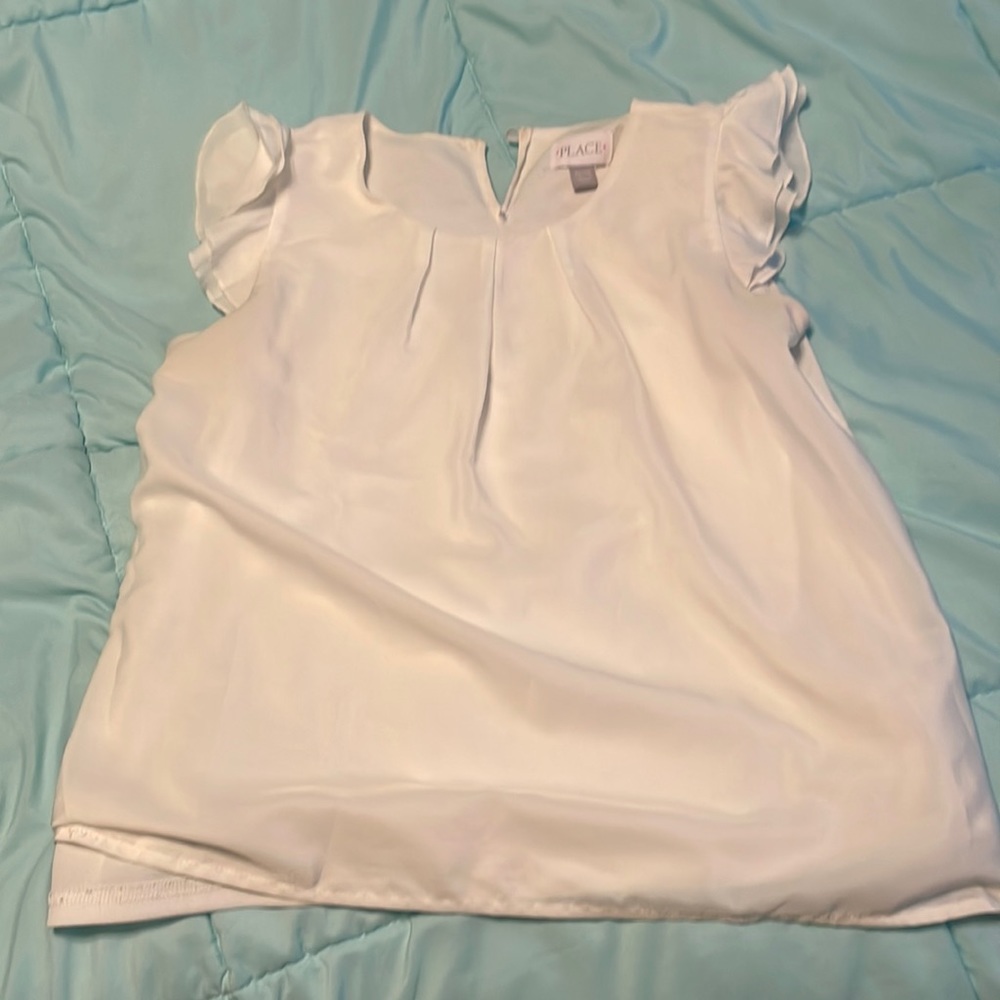 Cute white children’s blouse
